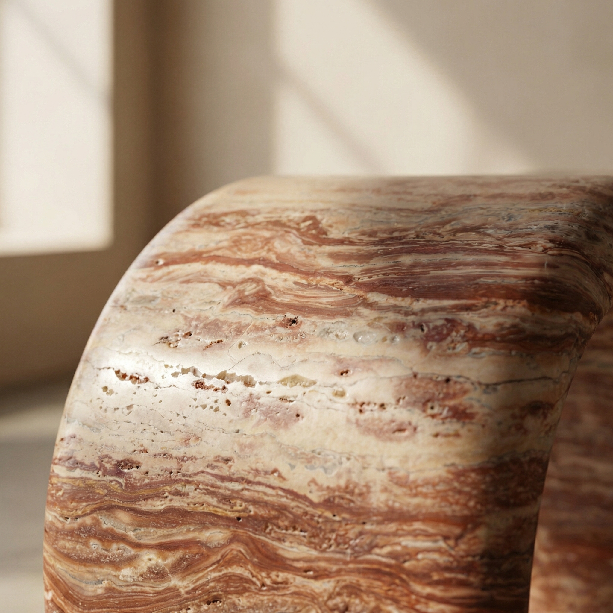 Aime surface detail — the stone's texture under close light