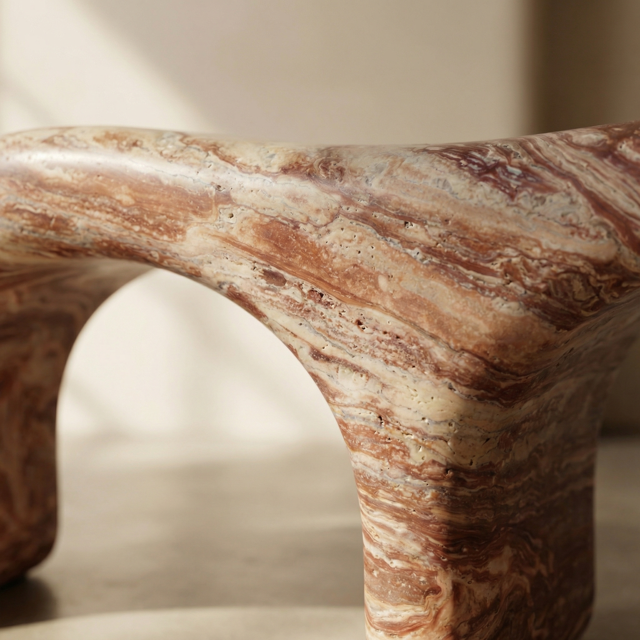 Surface transition detail — stone meeting stone at the object's base