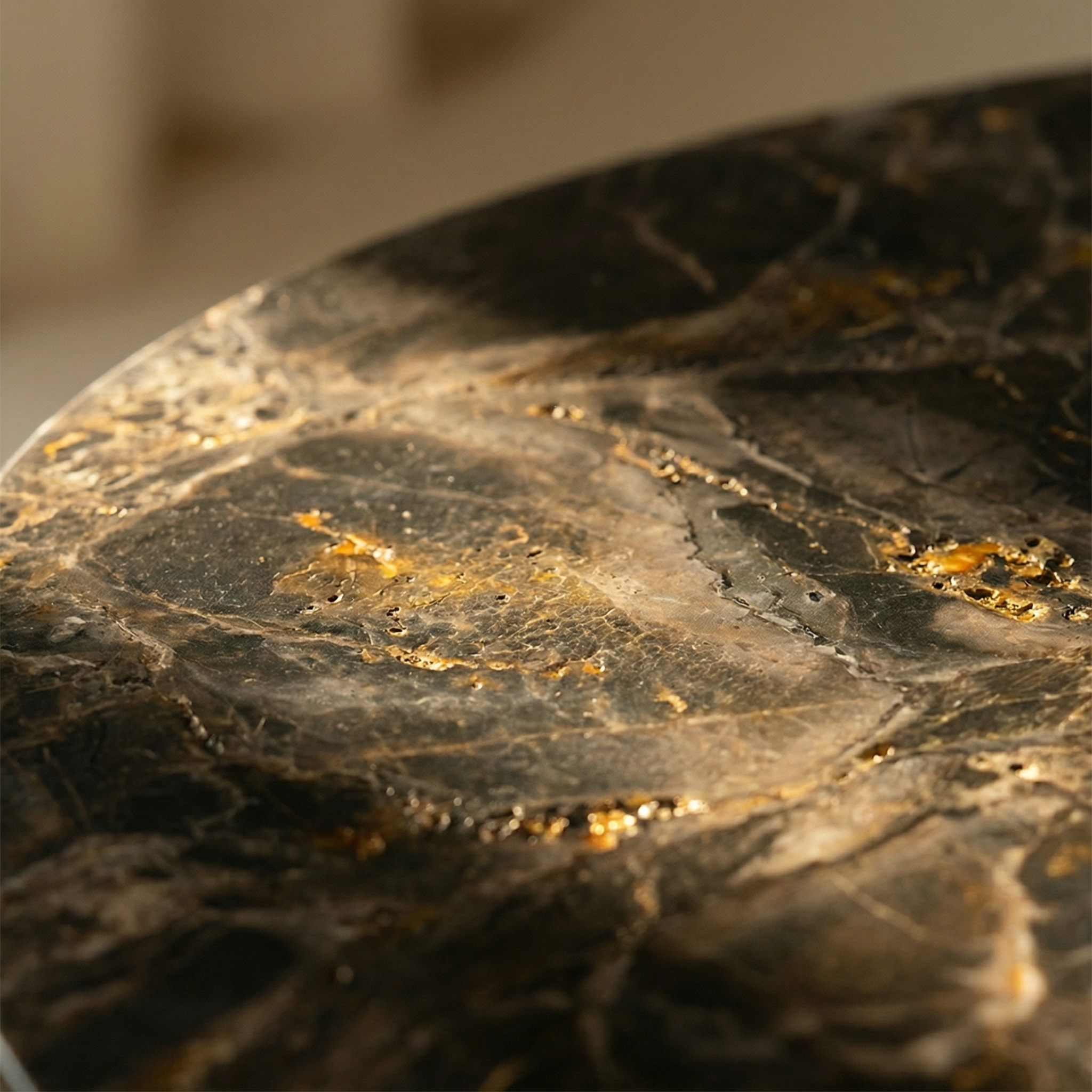 Bronze surface detail — the warm mineral depth of the stone