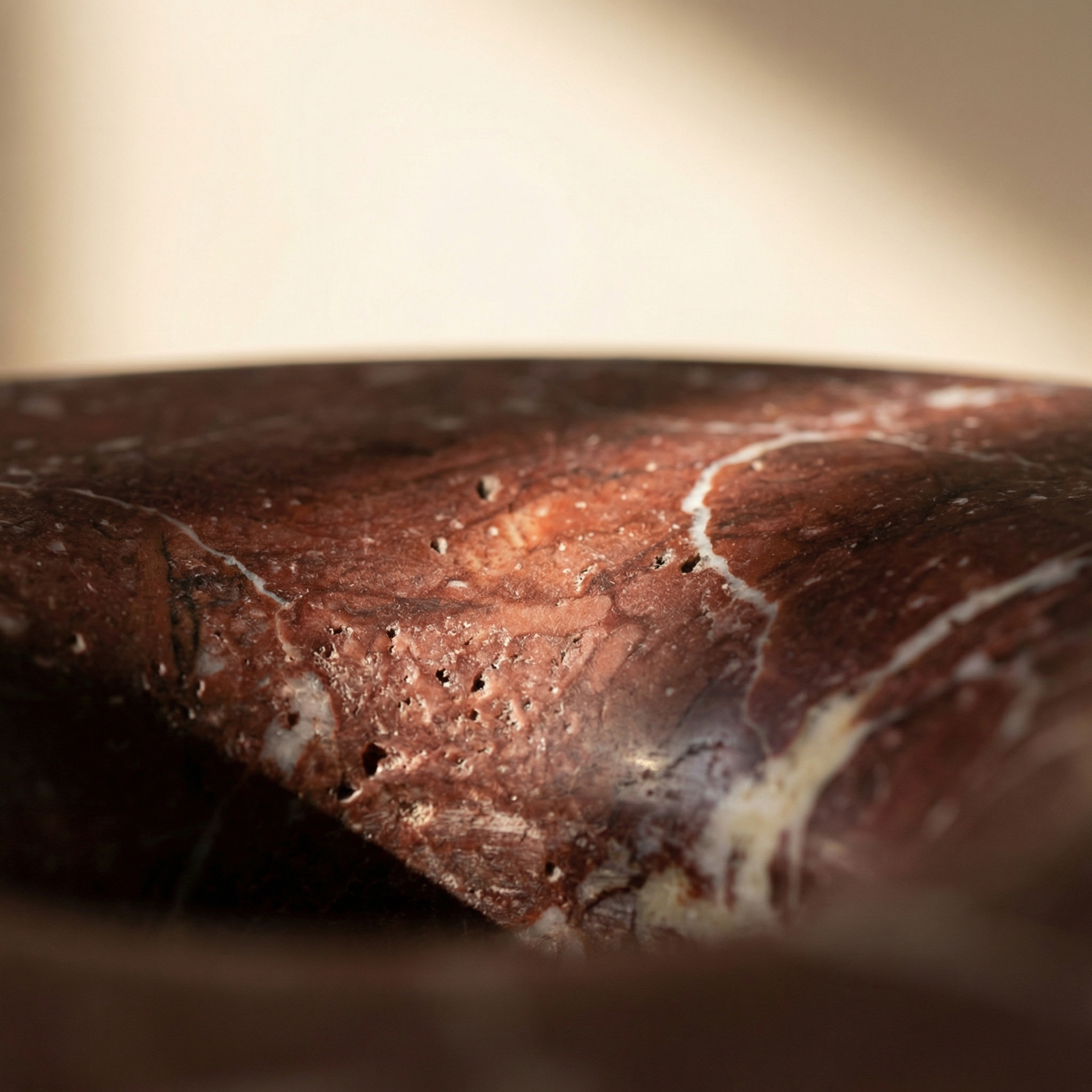 Deau surface detail — polished interior against honed exterior