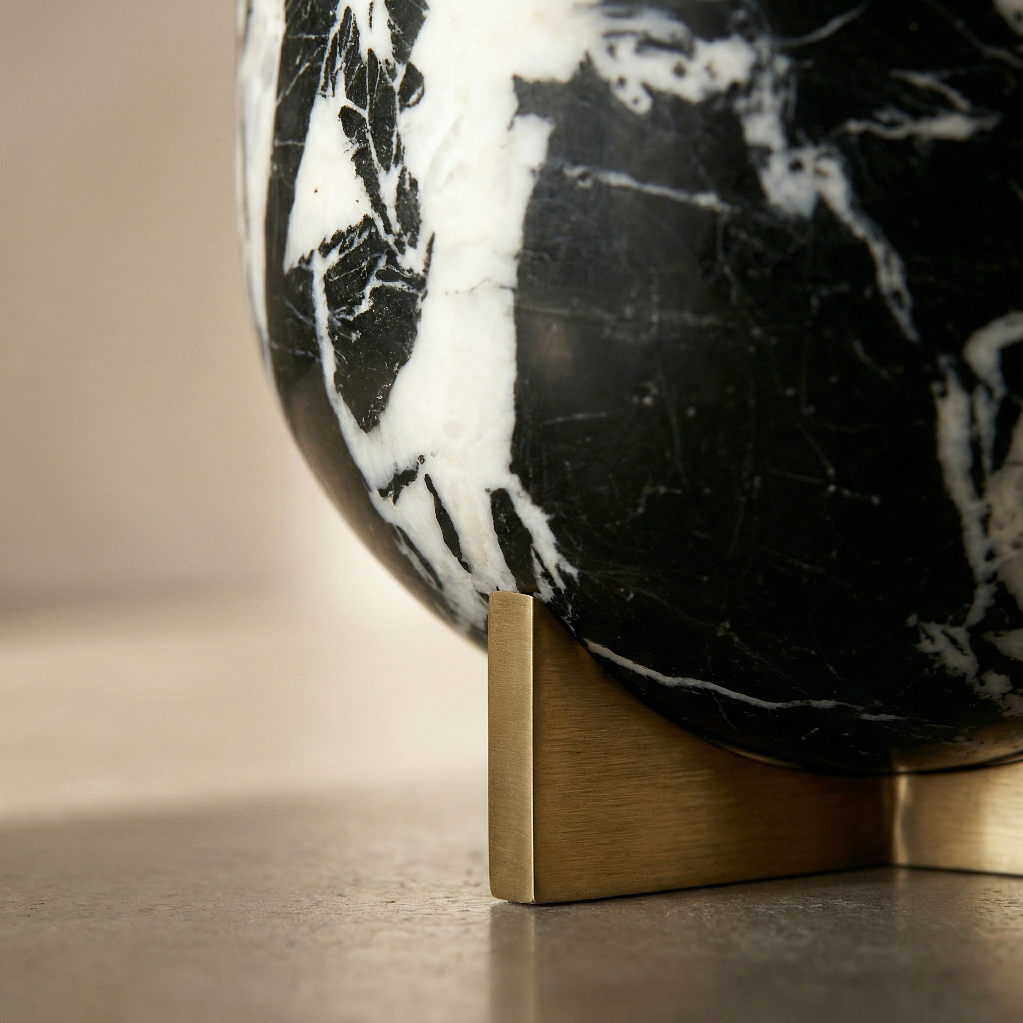 Base detail — the turned foot of the Doge Small in polished marble