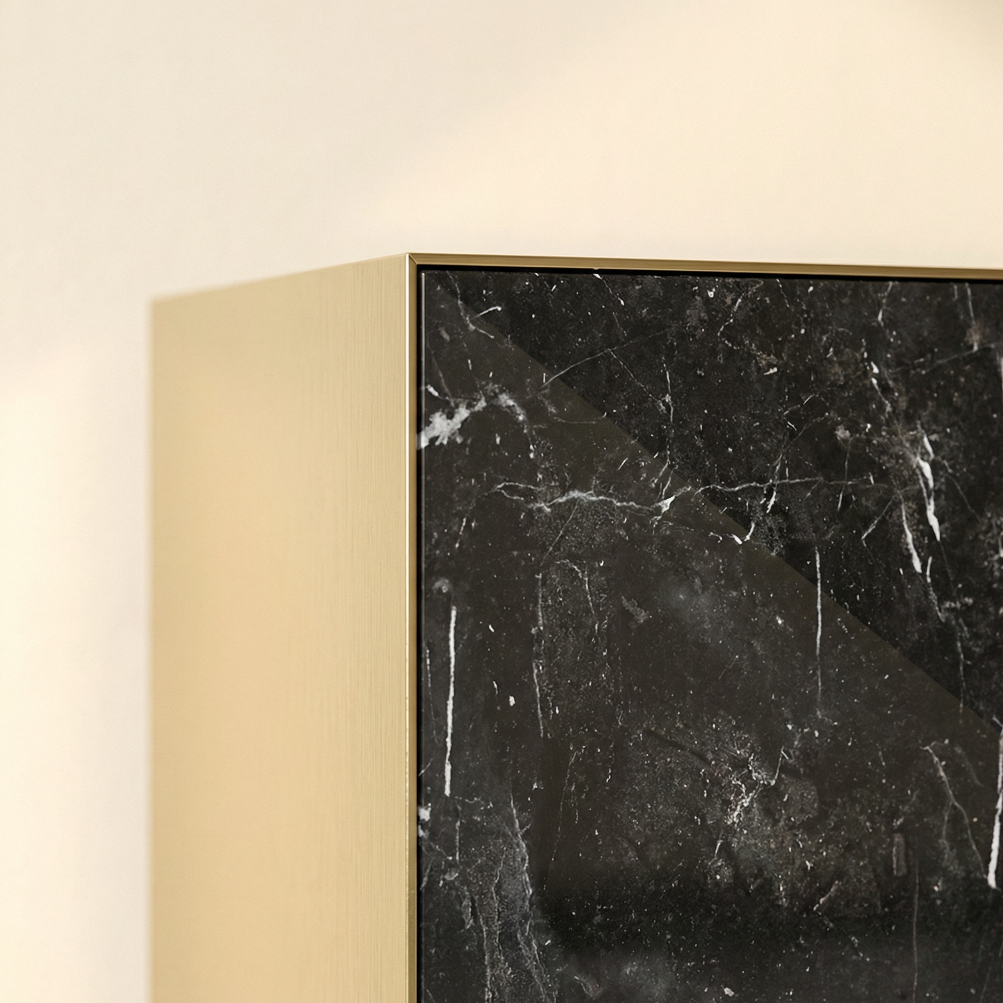 Hand-brushed brass joint and marble surface detail