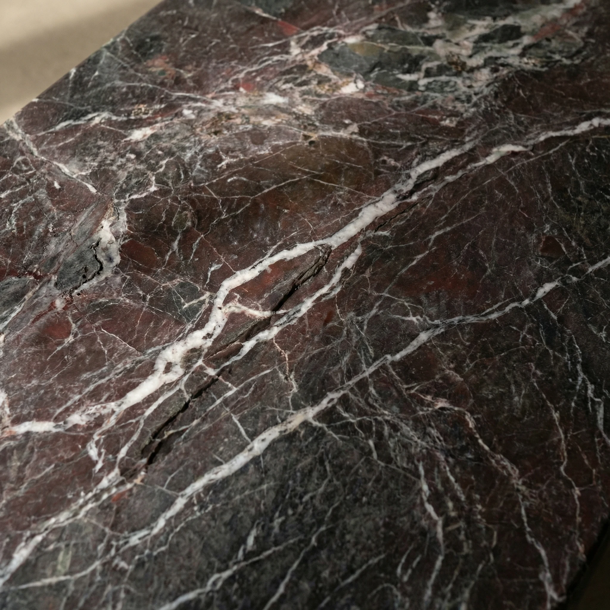Close-up of stone veining on Morphe table surface